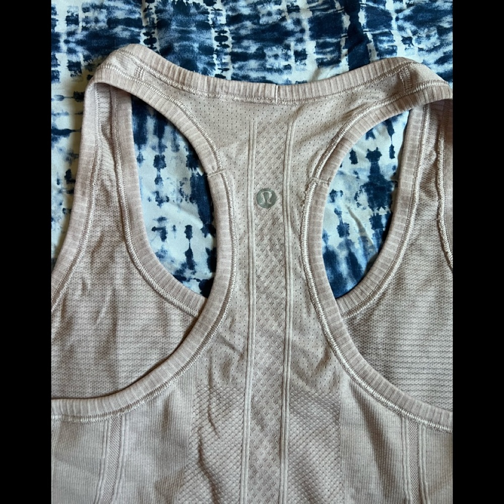 lululemon sleeveless shirt for women size 6. I accept offers